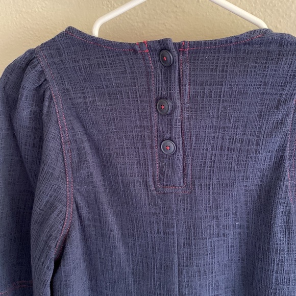 Soft top with puffed sleeves. Cute button back. - Picture 6 of 6